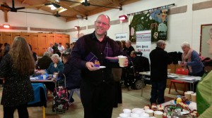 Tartan Juggler sampling a cup  cake!