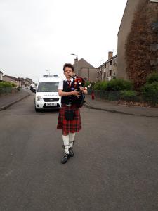 Piper leading walking parade