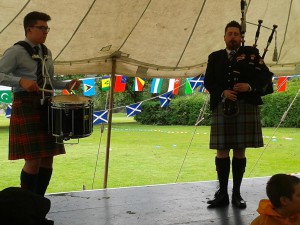 Musicians welcoming the Queen's Baton